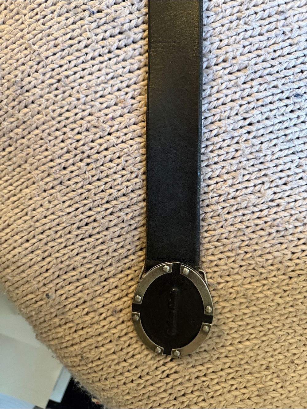 Calvin Klein Black Leather Belt with Circular Metal Emblem